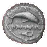Pièce phénicienne, avec les symboles relatifs à la ville de Tyr, la mer, le murex